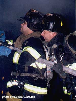 February 
26, 2001; Bronx Box 2231 at Jackson Avenue and East 149 Street. Firefighters Torres 
(nozzle) and Cullen (back-up) knock down remaining fire.