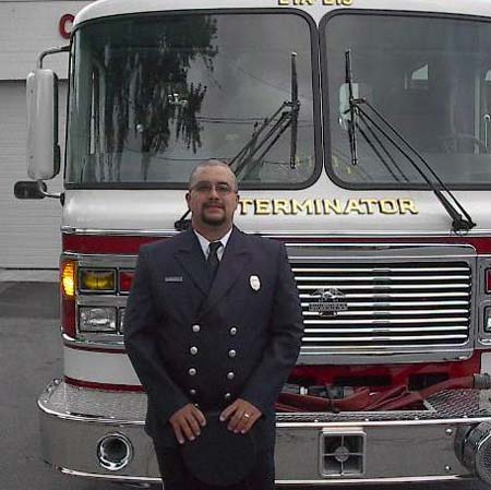 Paul, in front of The Terminator - went Bald for the Brothers